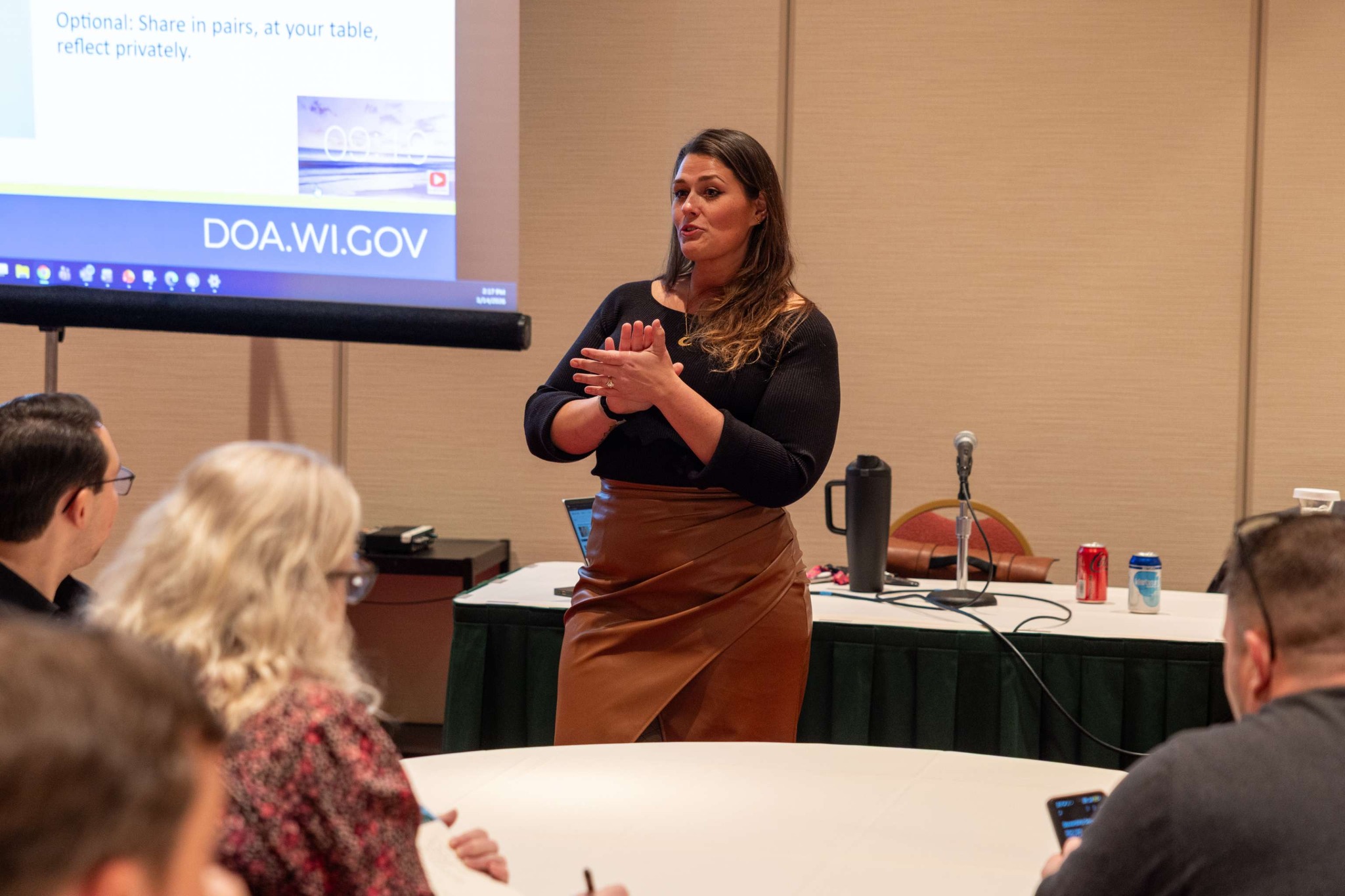 SEERO Director Samantha Swanson presents to a room of DOA leaders